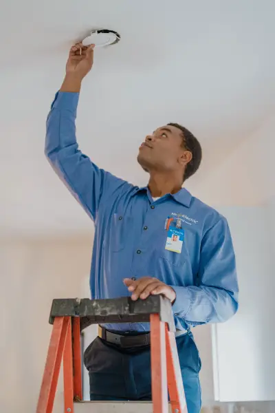 Mr. Electric of Knoxville electrician performing electrical wiring updates