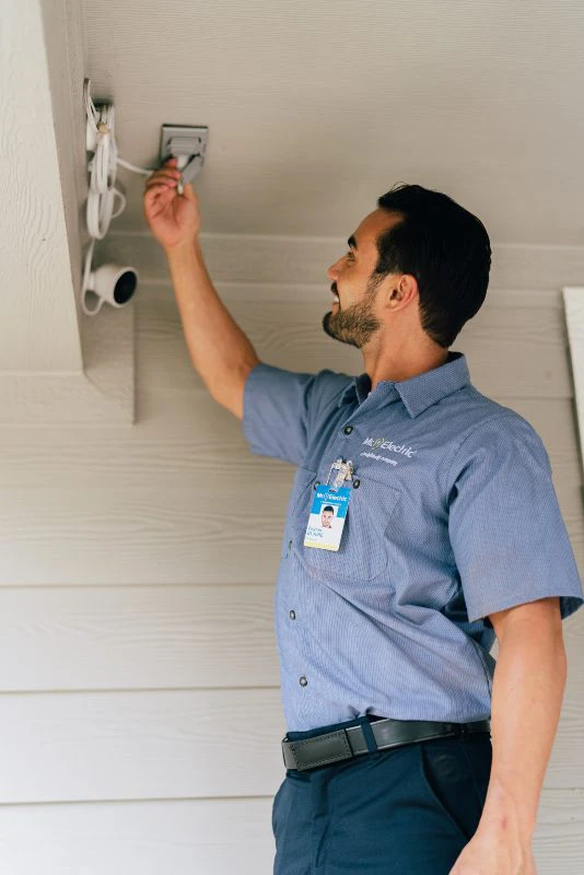 Mr. Electric of Palo Alto electrician installing motion sensor security lights