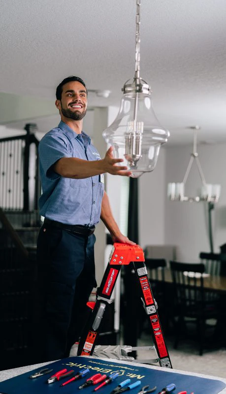 Mr. Electric electrician upgrading a home to retrofit lighting.
